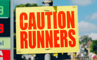 Sign with: caution runners