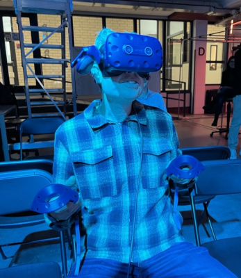 XR participant trying his best to figure out what to do on a very fast moving virtual train 