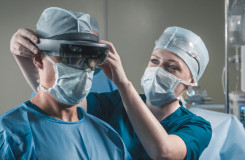 A healthcare professional in the operating room with an XR headset. 